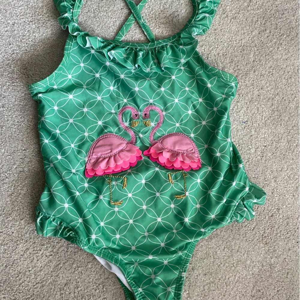 Crown and Ivy kids swim suit. Size 6. Smoke free home.